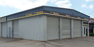 about us total auto care center building before